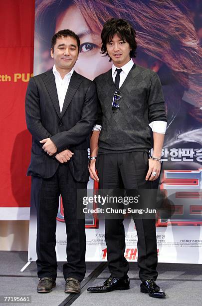 Director Masayuki Suzuki and actor Takuya Kimura attend a photocall after their news conference at the premiere of 'HERO' at the 12th Pusan...