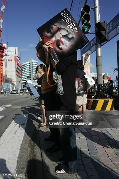 Tourists visit PIFF Plaza on the second day of the 12th Pusan International Film Festival October 5, 2007 in Pusan, South Korea. The festival will...