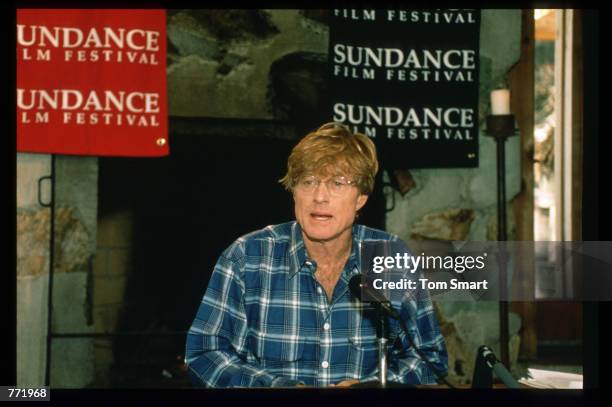Robert Redford poses for a picture at a press conference for the film "Four Weddings and a Funeral" January 21, 1994 in Salt Lake City, Utah. Redford...
