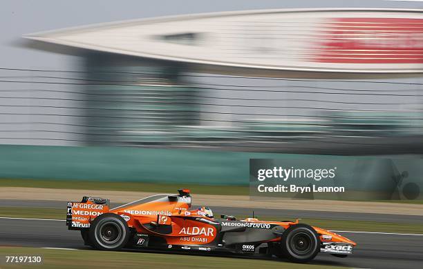 Adrian Sutil of Germany and Spyker F1 drives during practice for the Chinese Formula One Grand Prix at the Shanghai International Circuit on October...