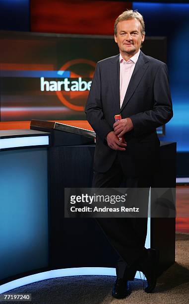 Presenter Frank Plasberg poses during the photo call for the political talkshow "hart aber fair" at the City Globe Studio on October 5, 2007 in...