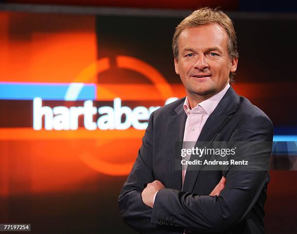 Presenter Frank Plasberg poses during the photo call for the political talkshow "hart aber fair" at the City Globe Studio on October 5, 2007 in...