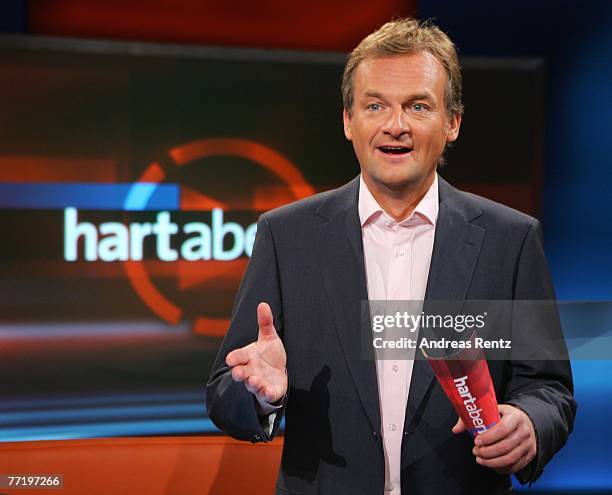 Presenter Frank Plasberg poses during the photo call for the political talkshow "hart aber fair" at the City Globe Studio on October 5, 2007 in...