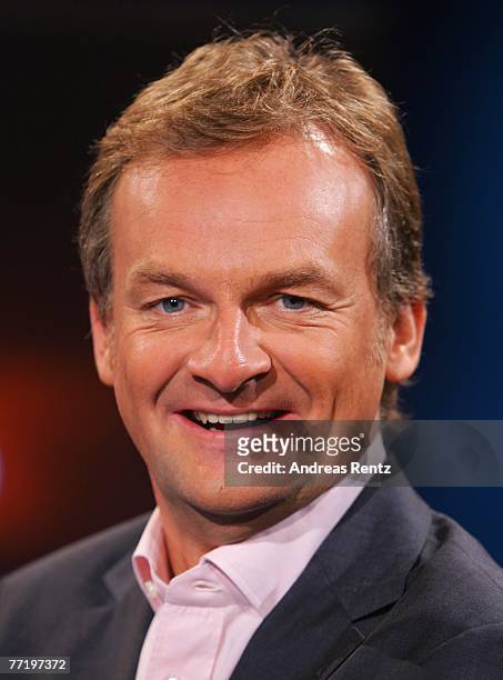 Presenter Frank Plasberg looks on during the photo call for the political talkshow "hart aber fair" at the City Globe Studio on October 5, 2007 in...