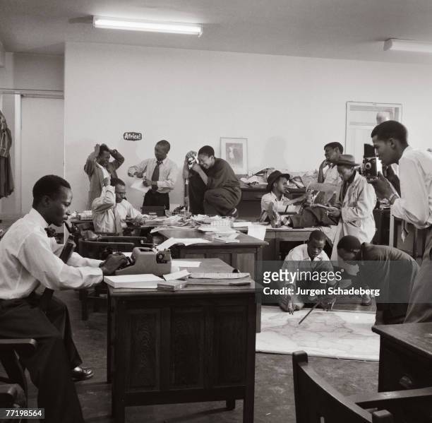 The office of 'Drum' magazine in Johannesburg, 1954. The journalists include Henry Nxumalo, Ezekiel Mphahlele, Casey Motsisi, Can Themba, Arthur...