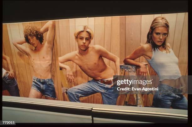 Calvin Klein advertisement is displayed on a city bus August 23, 1995 in New York City. The advertising campaign, which included print ads and...