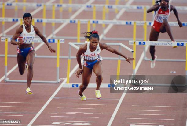 Gail Devers of the United States stumbles and falls across the finishing line after clipping the10th hurdle in the Women's 100 metres Hurdles final...