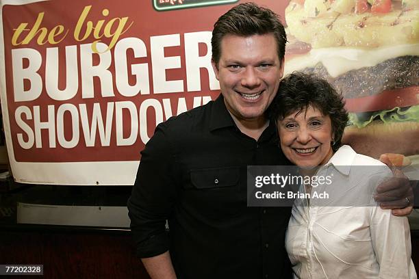 Chef Tyler Florence with "Big Burger Showdown" winner Barbara Estabrook during Tyler Florence Judges Applebee's "Big Burger Showdown" on October 4 at...