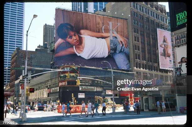 Calvin Klein advertisement is displayed on a billboard in Times Square August 23, 1995 in New York City. The advertising campaign, which included...