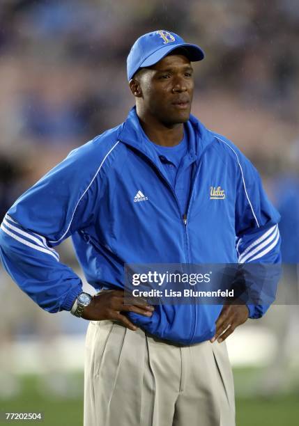 Head coach Karl Dorrell of the UCLA Bruins looks on during warm ups before the game against the Washington Huskies at the Pasadena Rose Bowl on...