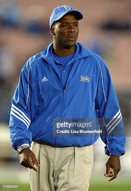 Head coach Karl Dorrell of the UCLA Bruins looks on during warm ups before the game against the Washington Huskies at the Pasadena Rose Bowl on...