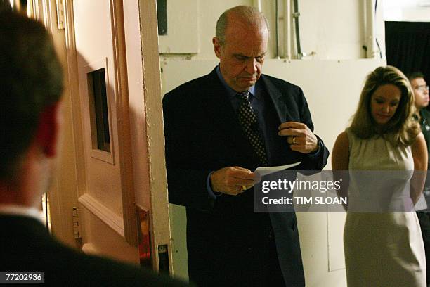 Presidential Candidate Fred Thompson looks at his note cards backstage with his wife, Jeri Thompson at his side while he is introduced at the...