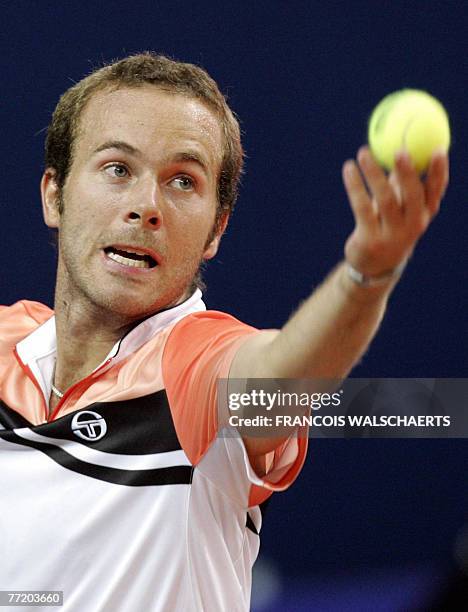 Belgian Olivier Rochus serves to Romanian Andrei Pavel during their ATP "Ethias Trophy" in Mons, 05 October 2007. AFP PHOTO / BELGA PHOTO / FRANCOIS...