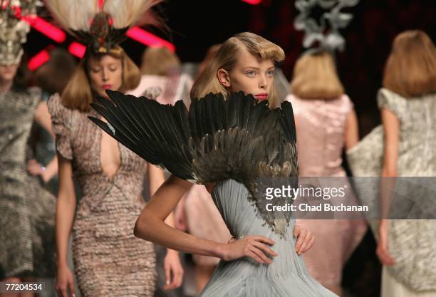 Models walk on the catwalk during the Alexander McQueen Spring/Summer 2008 fashion show at the Salle Marcel Cerdan on October 5, 2007 in Paris,...