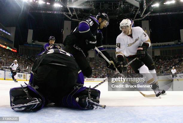 Goaltender Jason LaBarbera and Michal Handzus of the Los Angeles Kings combine to stop Bobby Ryan of the Anaheim Ducks on September 30, 2007 at the...