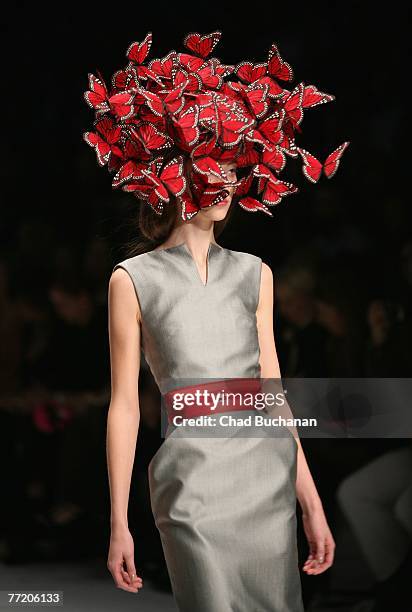 Model walks on the catwalk during the Alexander McQueen Spring/Summer 2008 fashion show at the Salle Marcel Cerdan October 5, 2007 in Paris, France.