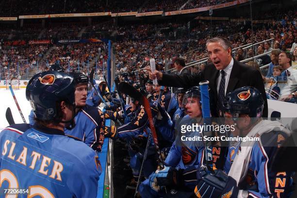 Head Coach Bob Hartley of the Atlanta Thrashers gives instructions to the team during the game against the Washington Capitals at Philips Arena on...