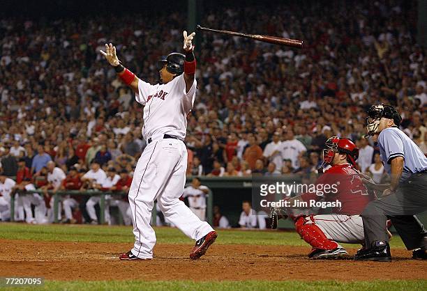 Manny Ramirez of the Boston Red Sox connects for a three-run home run to defeat the Los Angeles Angels, 6-3, in Game 2 of the American League...