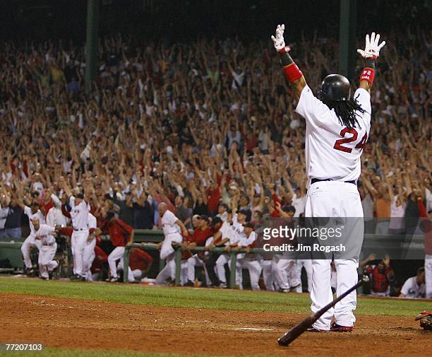 Manny Ramirez of the Boston Red Sox celebrates after connecting for a three-run home run to defeat the Los Angeles Angels, 6-3, in Game 2 of the...