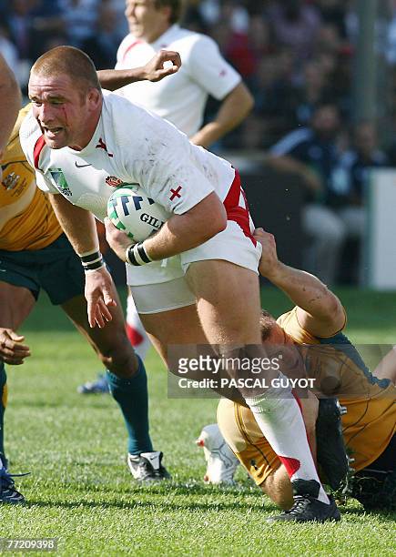 England's prop and captain Phil Vickery powers his way through Australia's defence during the rugby union World Cup quarter final match Australia vs....