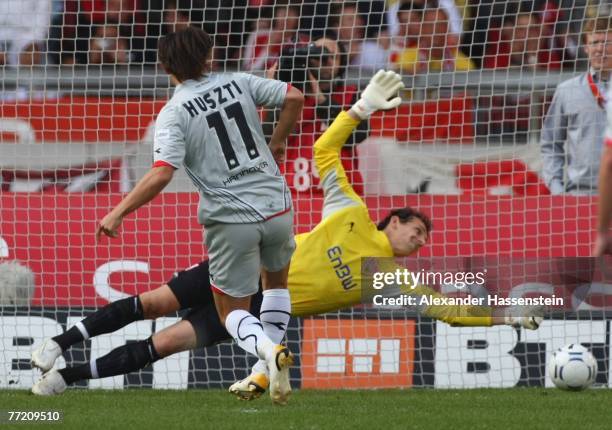 Szabolcs Huszti of Hannover scores the first goal during the Bundesliga match between VfB Stuttgart and Hannover 96 at the Gottlieb-Daimler-Stadium...