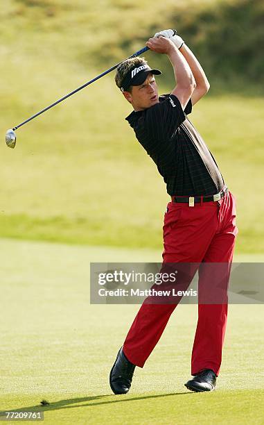 Luke Donald of England plays his second shot to the 17th hole during the third round of The Alfred Dunhill Links Championship at Kingsbarns Golf...