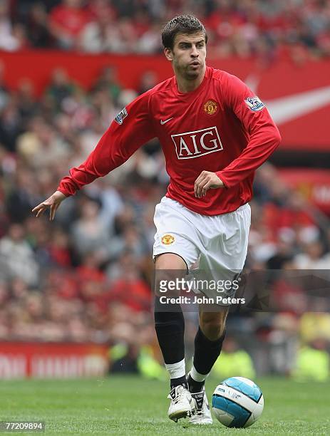 Gerard Pique of Manchester United in action during the Barclays FA Premier League match between Manchester United and Wigan Athletic at Old Trafford...
