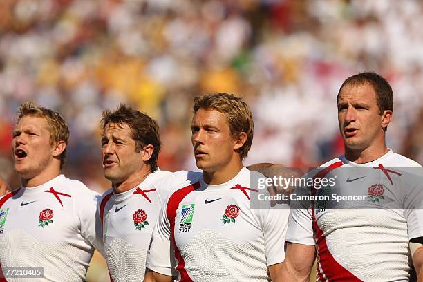 Josh Lewsey ,Andy Gomarsall, Jonny Wilkinson and Mike Catt of England line up to sing the national anthem prior to the Quarter Final of the Rugby...