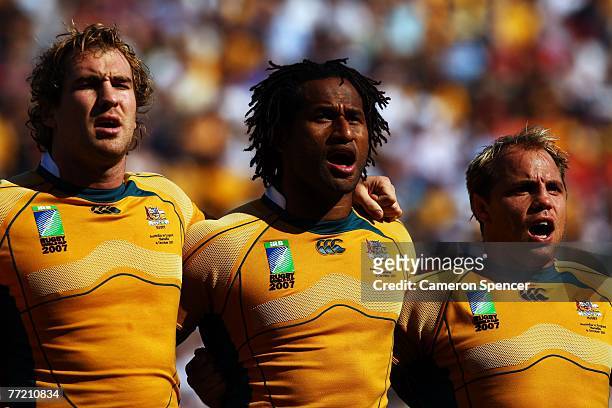 Rocky Elsom , Lote Tuqiri, and Phil Waugh of Australia sing their national anthem prior to the Quarter Final of the Rugby World Cup 2007 between...