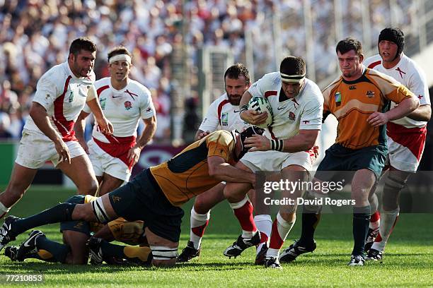 Andrew Sheridan of England is tackled by Daniel Vickerman of Australia during the Quarter Final of the Rugby World Cup 2007 between Australia and...