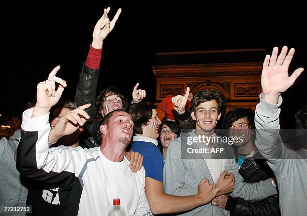 Supporters of the French rugby union team jubilate after the world cup quarter-final between New Zealand and France, 06 October 2007 on the...