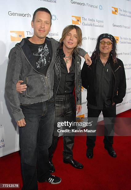 Muscians Mike Malinin, Johnny Rzeznik and Robby Takac of the Goo Goo Dolls arrive to the Andre Agassi 12th Annual Grand Slam for Children at the MGM...