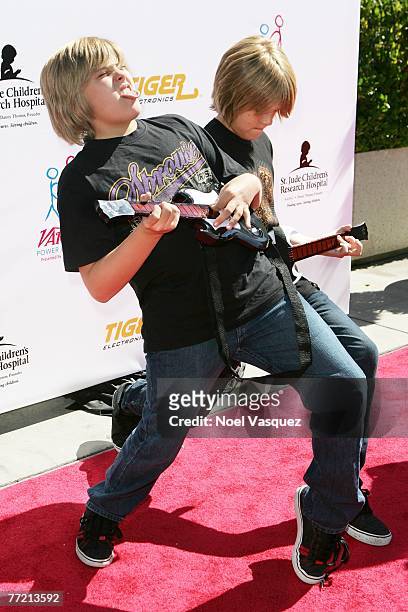 Actors Dylan and Cole Sprouse arrive at the Power of Youth Benefiting St. Jude Children's Hospital at the Globe Theater on October 6, 2007 in...