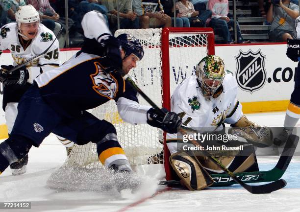 Radek Bonk of the Nashville Predators tries a wraparound shot on Mike Smith of the Dallas Stars on Saturday, October 6, 2007 at The Sommett Center in...