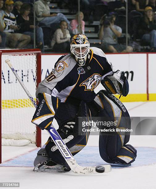 Chris Mason of the Nashville Predators deflects a shot in a game against the Dallas Stars at the Sommet Center on October 6, 2007 in Nashville,...