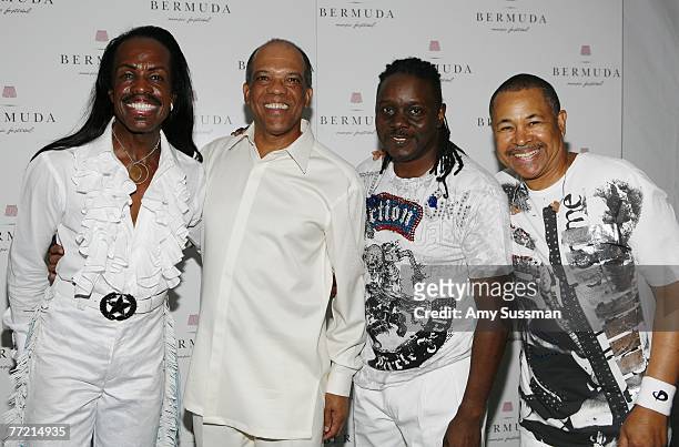 Verdine White, Dr. Ewart F. Brown, Philip Bailey and Ralph Johnson attend the last night of the Bermuda Music Festival at the National Sports Center...