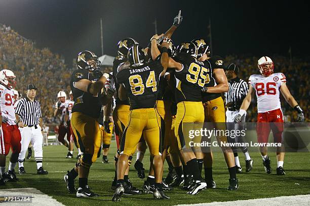 Members of the Missouri Tigers mob Martin Rucker following a touchdown against the Nebraska Cornhuskers during 2nd-half action on October 6, 2007 at...