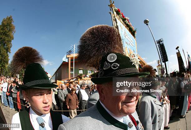 Traditionally dressed Bavarian riflemen wait in front of the giant bronze figure Bavaria during the last day of Oktoberfest beer festival on October...