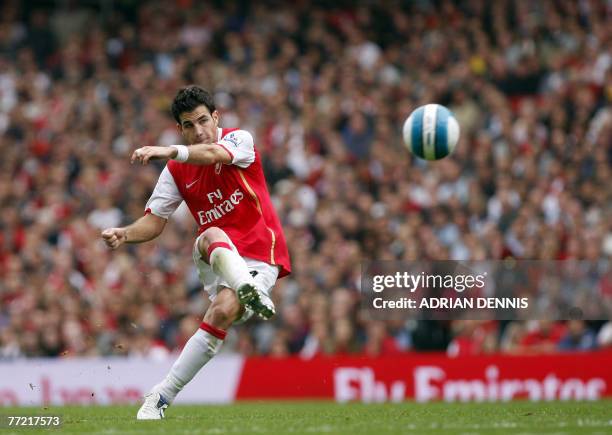 Arsenal's Spanish player Cesc Fabregas curls a free kick at goal against Sunderland during the Premiership football match at The Emirates Stadium in...