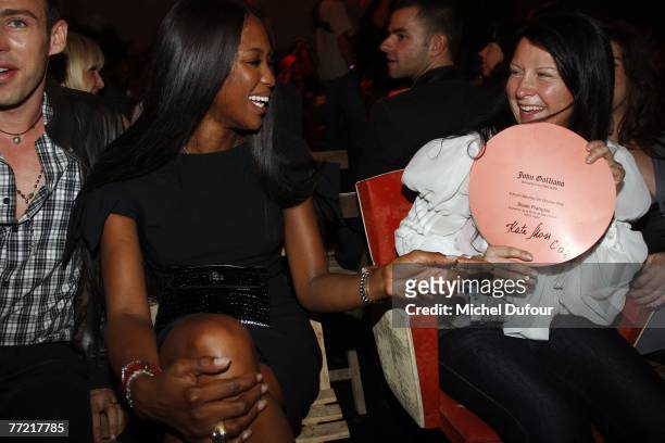 Alexis Roche and Naomi Campbell attends the John Galliano fashion show, during the Spring/Summer 2008 ready-to-wear collection show at Stade Francais...