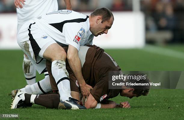 Erwin Koen of Paderborn fights for the ball with Marvin Braun of St.Pauli during the Second Bundesliga match between FC St.Pauli and SC Paderborn at...