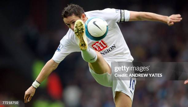Robbie Keane of Tottenham Hotspur controls the ball during the Premier league football match against Liverpool at Anfield , Liverpool,07 October ,...