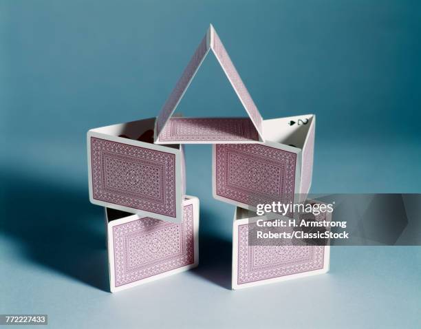 228 Pyramid Of Cards Stock Photos, High-Res Pictures, and Images ...