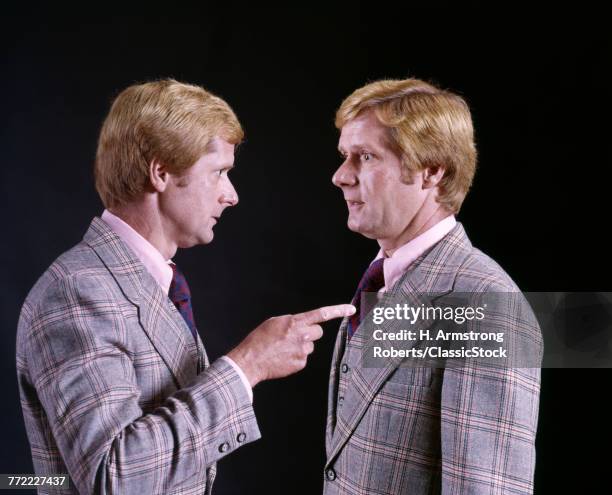 1970s BLOND MAN IN PLAID THREE PIECE SUIT POINTING ACCUSING FINGER AT HIMSELF HUMOROUS DOUBLE EXPOSURE