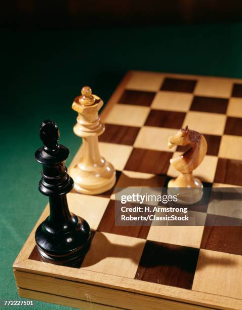 3 CHESS PIECES ON CHESSBOARD CHECKMATE GAME STRATEGY GAMES WIN