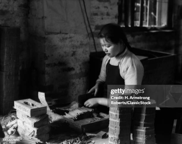 1920s 1930s CHINESE WOMAN CUTTING PAPER TUBES FIRECRACKER FACTORY WORK HONG KONG CHINA