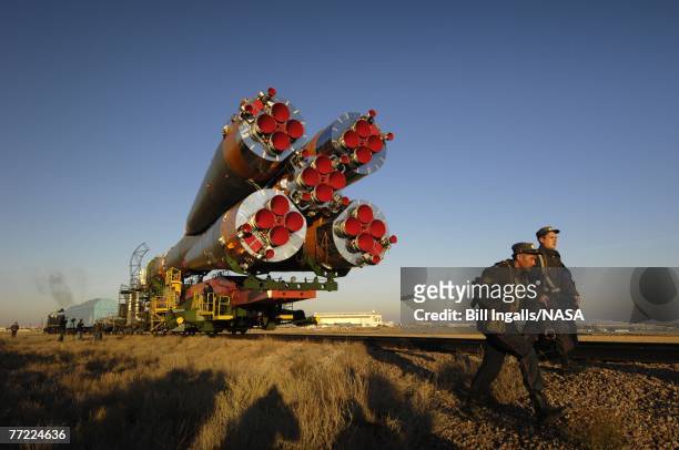 In this handout image supplied by NASA, The Soyuz TMA-11 spacecraft is transported by railcar to its launch pad at the Baikonur Cosmodrome, on...