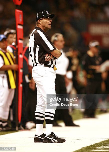 Line judge Tom Barnes works the game between the Carolina Panthers and the New Orleans Saints at the Superdome on October 7, 2007 in New Orleans,...