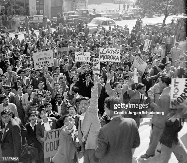 Crowd, including 800 Indian schoolchildren, demonstrating outside Johannesburg Magistrates Court during the trial of anti-apartheid activists...