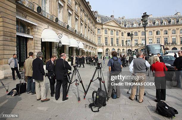 Cameraman film in front of the justice ministry, 08 October 2007 on the Vendome square in Paris, prior to the British investigators into the death of...